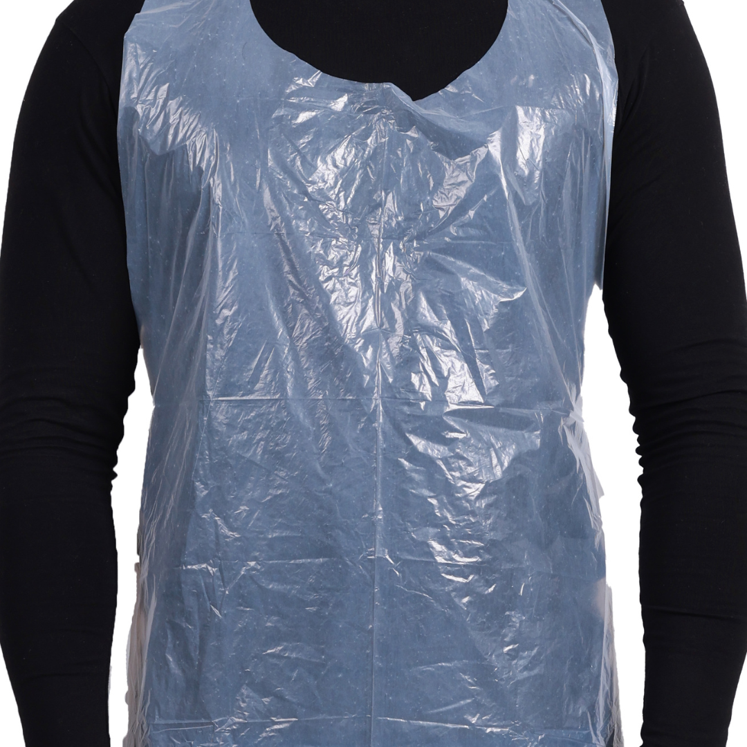 Clear disposable plastic aprons by CE Disposables worn over black clothing for protective use