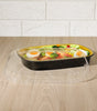 CE Disposables stackable tray lids 38oz clear plastic lid covering black food tray with salad